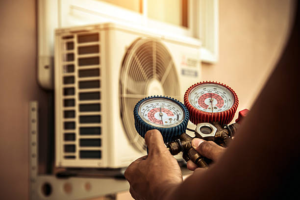 Professional Air Conditioning Service technician working in Midland, WA